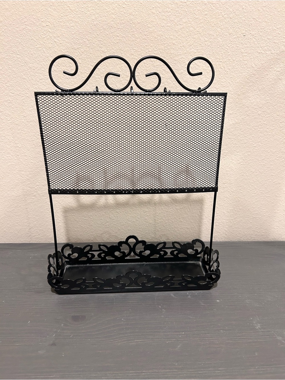Black metal jewelry stand
